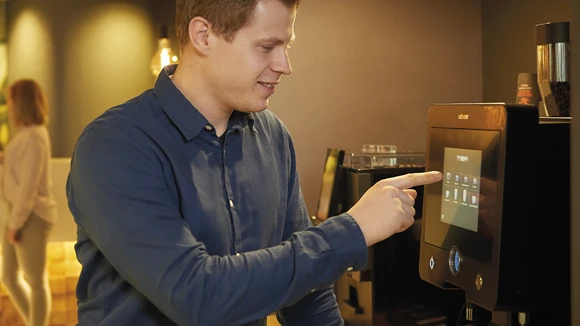 Ma_at_coffeemachine.png